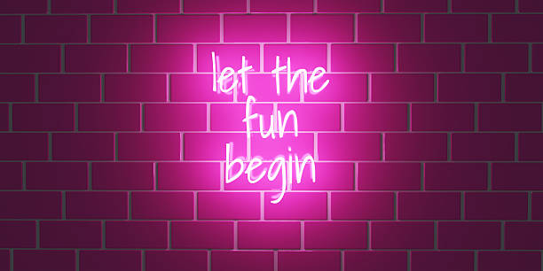 istock Neon text LET THE FUN BEGIN on brick wall background. Template design. Space for text. 3d render. 3d render. 2240413773
