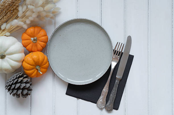 istock Thanksgiving background with pumpkins 2240415748