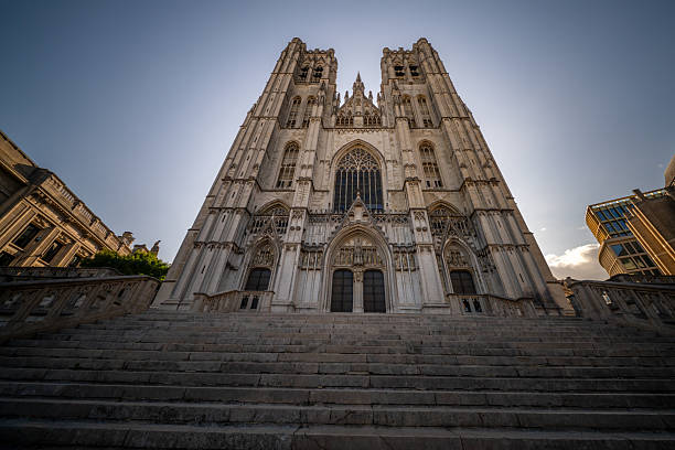 Grand cathedral facade with wide stone steps leading up.