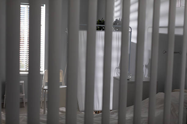 A serene and tranquil interior that features sheer curtains and gentle light, contributing to a calm atmosphere