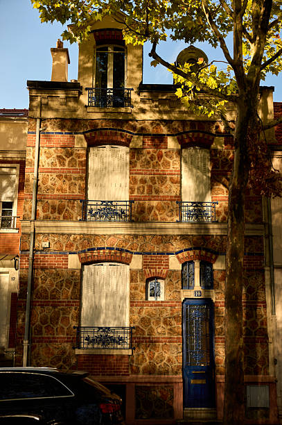 istock Parisian residential building facade with classic architecture 2240422412