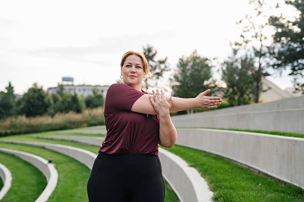istock Body positive woman warming up before training. 2240423562