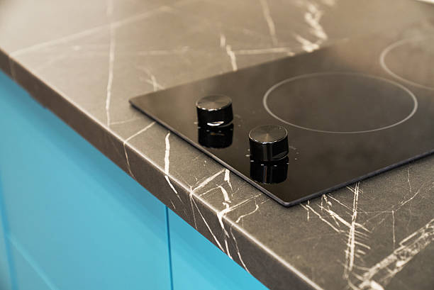 istock Modern kitchen countertop with induction hob. 2240423868