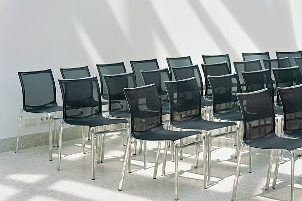 istock chairs lined up in a row in a room 2240431389