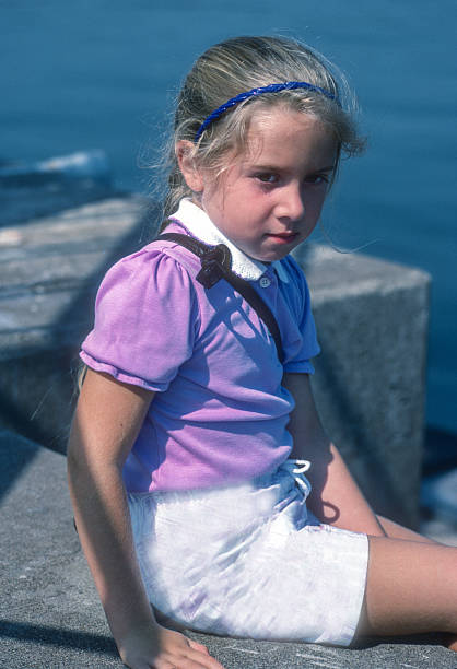 istock Two Harbors - Girl on Breakwater - 1988 2240433681