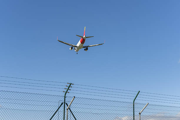 istock A passenger plane lowering the landing gear 2240433743