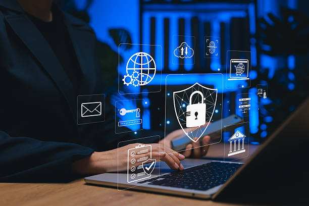 istock Cybersecurity and data breach risk. Woman using laptop with digital lock icon represent cyber security, data protection, secure access, encryption, online privacy, internet safety in modern technology 2240440171