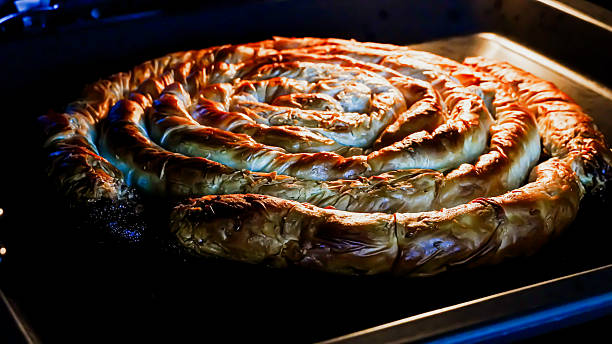 istock Traditional Turkish Type Pastry In Oven 2240440538