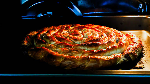 istock Traditional Turkish Type Pastry In Oven 2240440597