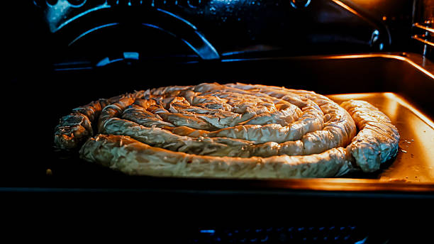 istock Traditional Turkish Type Pastry In Oven 2240440659
