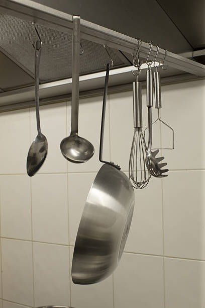 istock Hanging Cooking Utensils in a Neatly Organized Kitchen Space for Efficiency 2240453905
