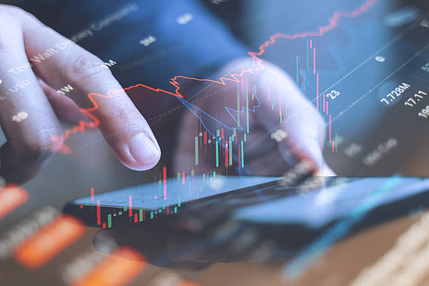 istock Businessman analyzing financial data on digital tablet. 2240463191