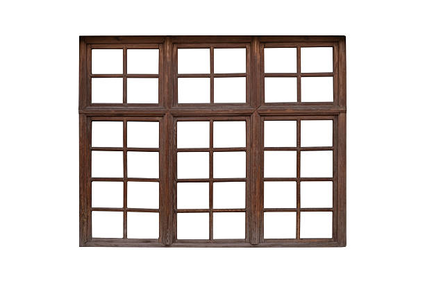 istock Large brown wooden window frame with multiple sashes is isolated. 2240467280