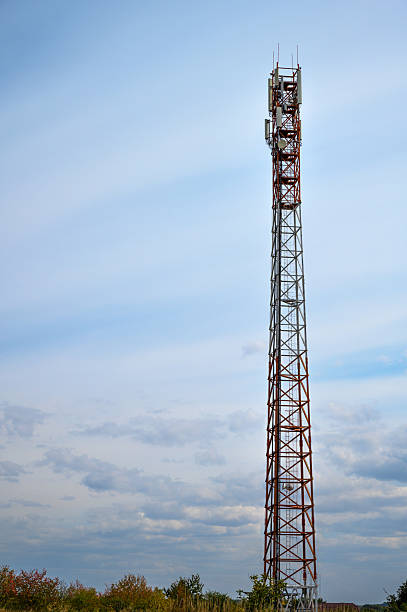 istock Sleek Communication Tower in Open Field 2240475830
