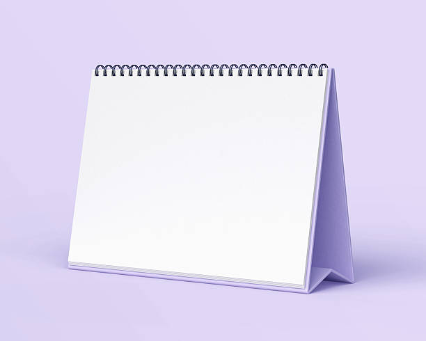 istock Blank desk calendar mockup on light purple background. 2240478748