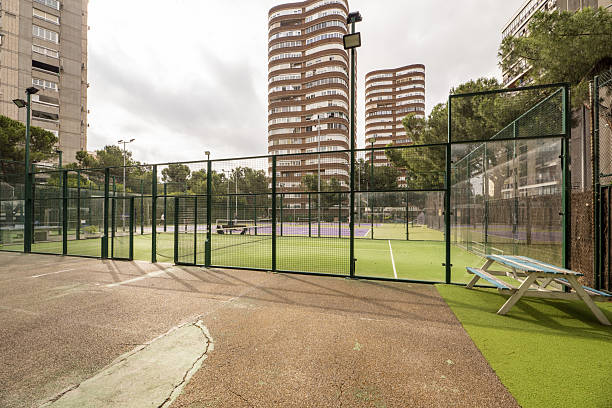 istock Paddle and tennis courts in the common landscaped 2240487783