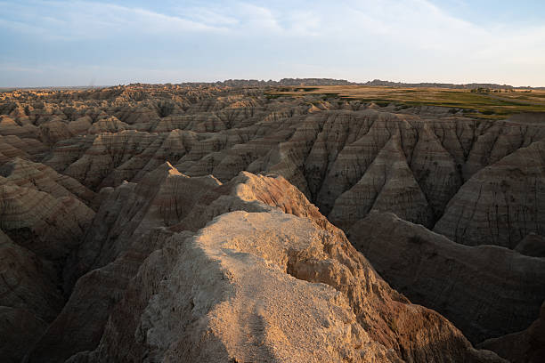 istock Golden hour over the Badlands National Park 2240490678