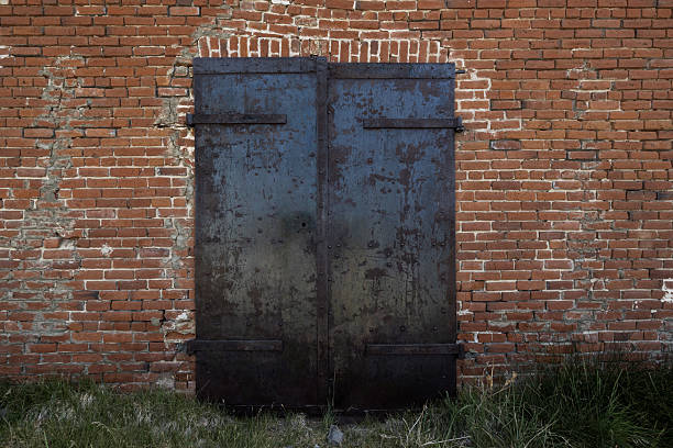 old black iron door open