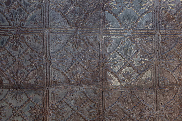 istock Rusted Vintage Stamped Metal Siding 2240491102