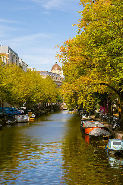 istock Boats in Amsterdam Canal 2240494996