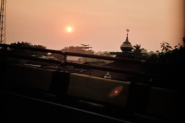 The setting sun sinking into a residential area of Tokyo.