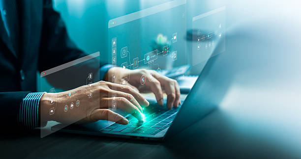 istock AI agent data tools and workflow automation concept with businessman typing on laptop and interacting with digital process interface for artificial intelligence development, integration, productivity 2240509724