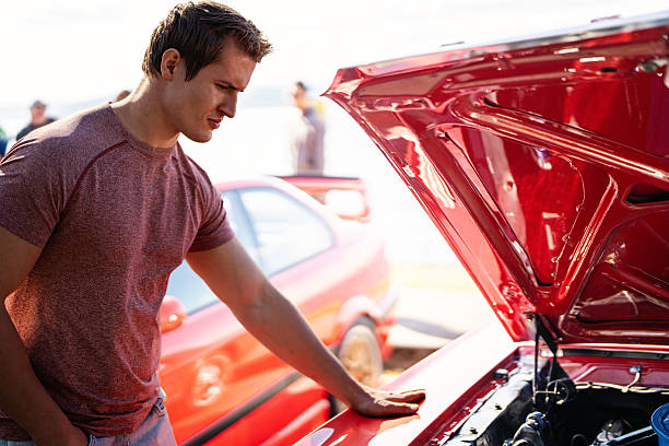 istock Man Standing by Muscle Car at Meetup 2240513292