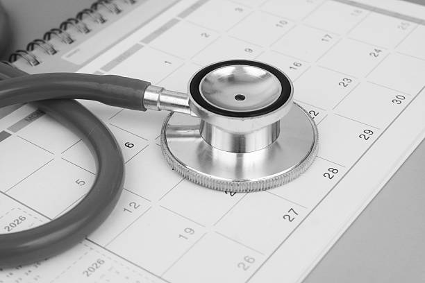istock Stethoscope on calendar page close up. 2240522253