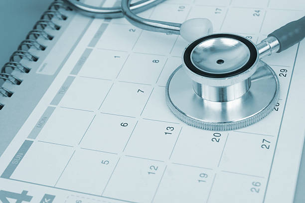 istock Stethoscope on calendar page close up. 2240522789