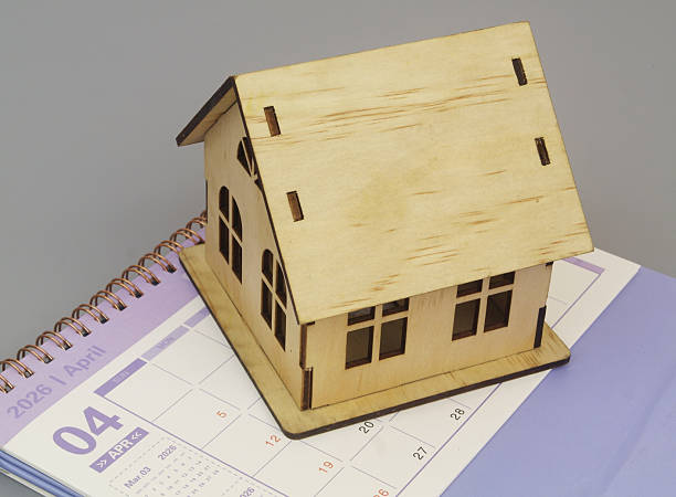 istock House model and calendar on grey background. 2240525027