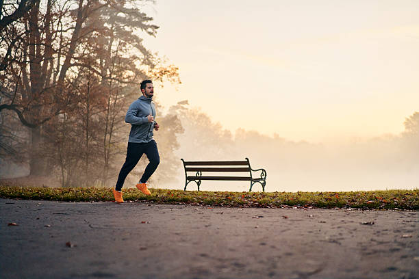 istock Active man exercising on a hazy autumn morning 2240528960