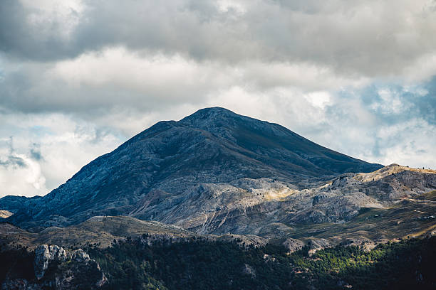 istock Majestic Rocky Mountain Summit Beneath Dramatic Sky 2240533443