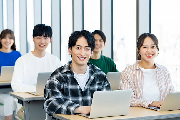 istock Male and female university students attending lectures 2240533758