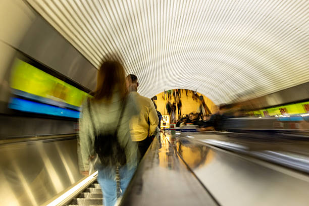 Escalators provide quick and easy access to local commuters and tourists up and down into the London Underground tunnels.