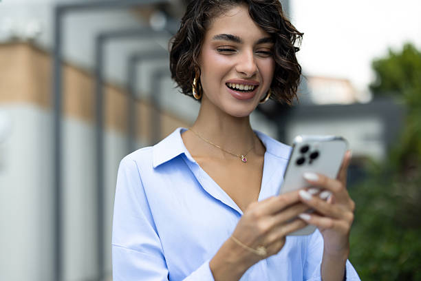 istock Modern woman with smartphone during city 2240540207