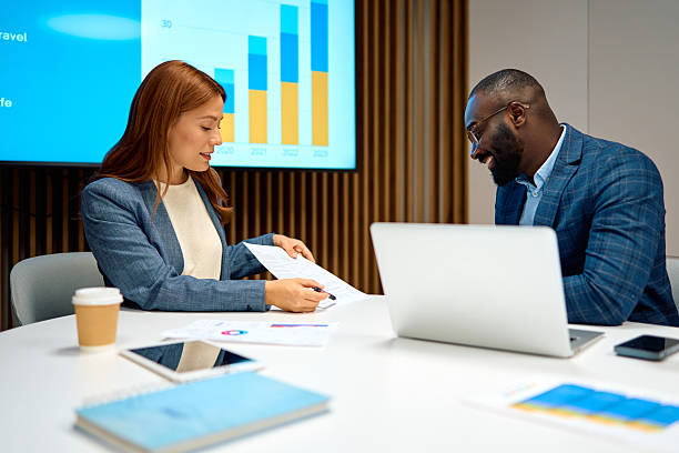 istock Business people discussing project strategy in modern office 2240545062