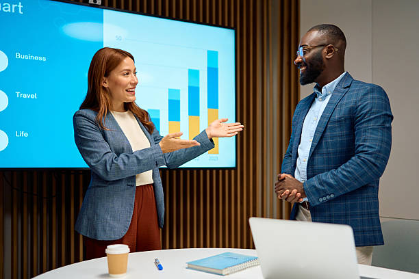 istock Diverse business colleagues discussing presentation in office meeting 2240545082