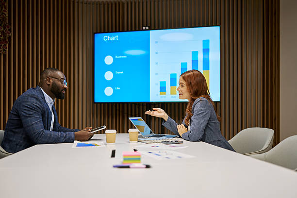 istock Diverse business professionals discussing financial data during office meeting 2240545251