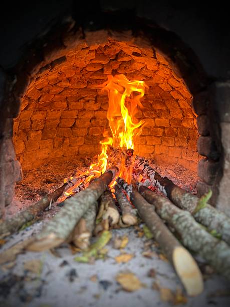 istock burning wood in a stone oven, ember fire... flames of fire 2240545256
