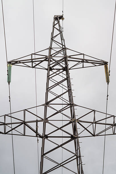 istock A High Voltage Power Transmission Tower Stands Tall Against a Dramatic Cloudy Sky Above 2240546340