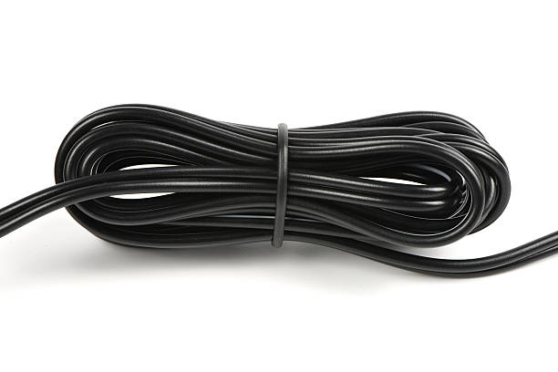 istock Black wires. Wires is strapped with a black plastic-coated wire tie isolated on white background. 2240546802