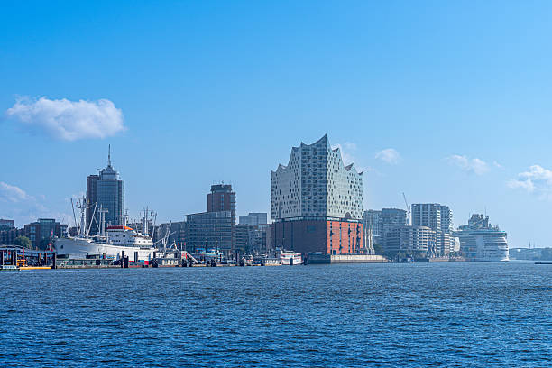 Germany, Hamburg, Harbor,  October 01, 2025 - Hamburg harbor with Elbphilharmonie with ships and office buildings