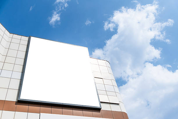 istock Single large blank billboard on the side of a building 2240553123