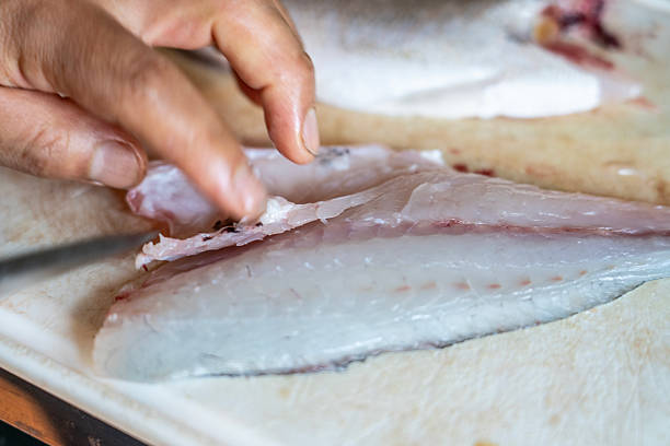 istock Preparing sea bass for a Peruvian traditional dish ceviche 2240555110