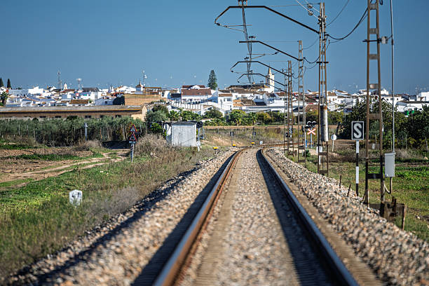 istock Railway line winding through Carrion de los Cespedes, Andalusia 2240555191