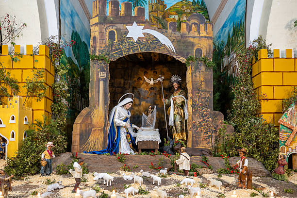 Shepherds gather around the nativity scene in S. Martin Church, awaiting the Child's arrival before Christmas Eve, showcasing traditional decorations.