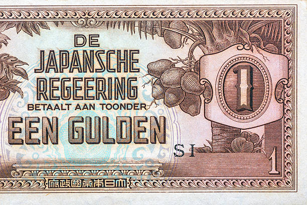 istock 1 Gulden Japanese Occupation 1942.Plate letter S prefix; breadfruit tree at left; coconut palm at right.With Dutch text: De Japansche Regeering (The Japanese Government).Bonistics. 2240559641