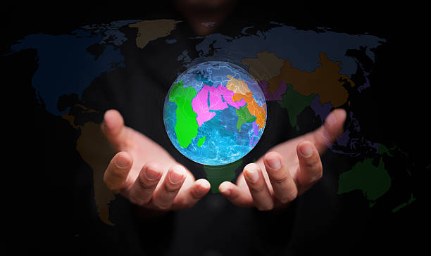istock Hands holding a glowing digital globe showing regional maps represent regionalism, global economic integration, and connection in the modern digital world 2240560052