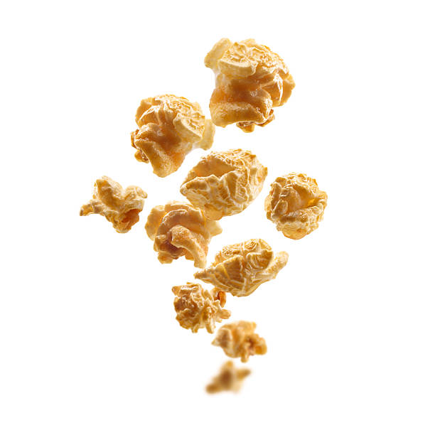 istock Caramel-flavored popcorn levitates on a white background 2240562468