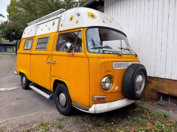 Freiburg, Germany October 9th 2025 Old classic car from the 1960s in orange. Not fully restored but in good shape. The car has a lot of patina, which enhances its charm. Oldie but goldie.